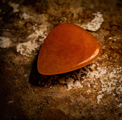 Rhodonite natural stone guitar pick – Moorland Distribution