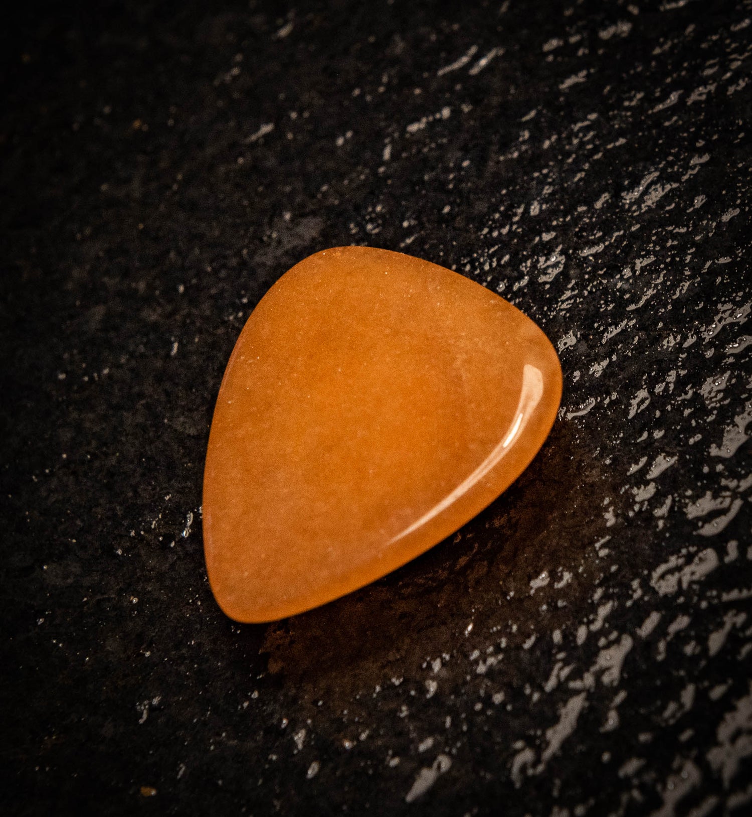 Rhodonite natural stone guitar pick – Moorland Distribution