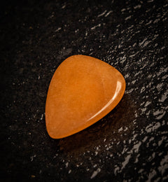 Rhodonite natural stone guitar pick – Moorland Distribution